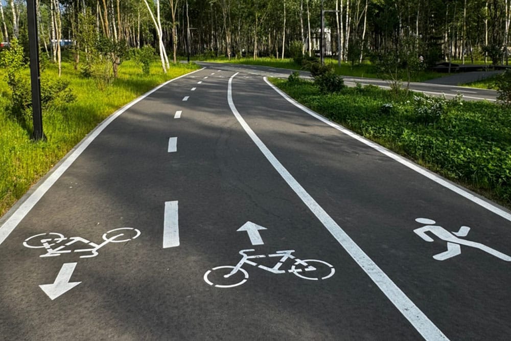 Shared pedestrian and cycle path with directional pavement markings