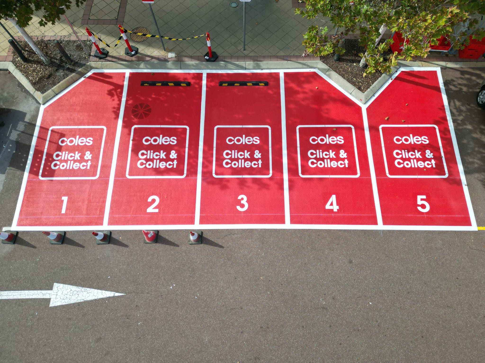 Red Coles Click and Collect bay markings at Coles Ellenbrook